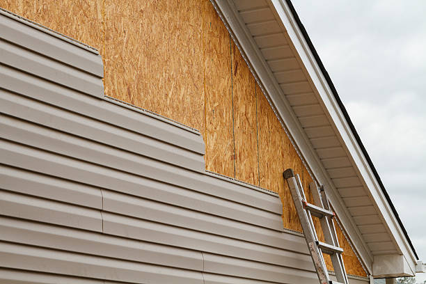 Professional Siding Replacement technician working in North Fort Myers, FL